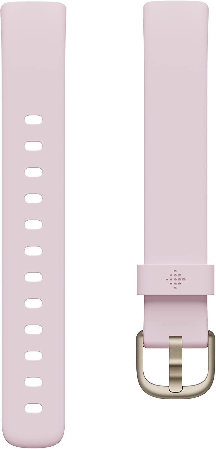 fitbit luxe special edition fitness and wellness tracker on a desk or shelf