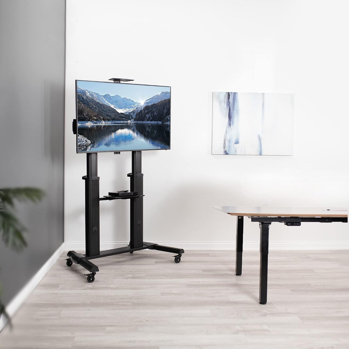 vivo aluminum mobile tv cart for 32 to shown in use