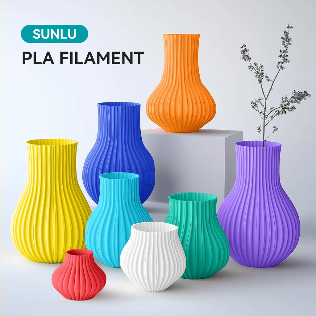 sunlu pla filament 1.75mm, 250g spool bundle, 3d on a desk or shelf